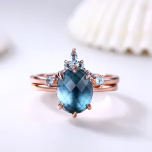 10x8mm Oval Cut London Blue Topaz Engagement Ring Set Rose Gold Curved Topaz Matching Band