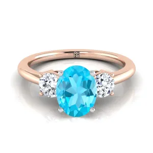 14K Rose Gold Oval Swiss Blue Topaz Perfectly Matched Round Three Stone Diamond Engagement Ring -1/4ctw