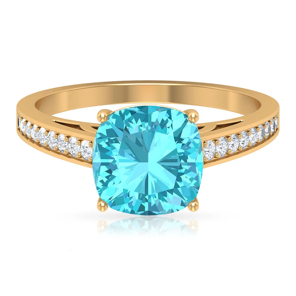 8.5 MM Cushion Cut Swiss Blue Topaz Solitaire with Diamond Side Stone Ring