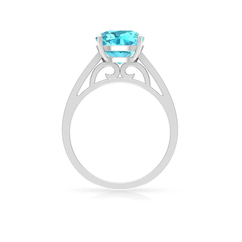 8.5 MM Cushion Cut Swiss Blue Topaz Solitaire with Diamond Side Stone Ring