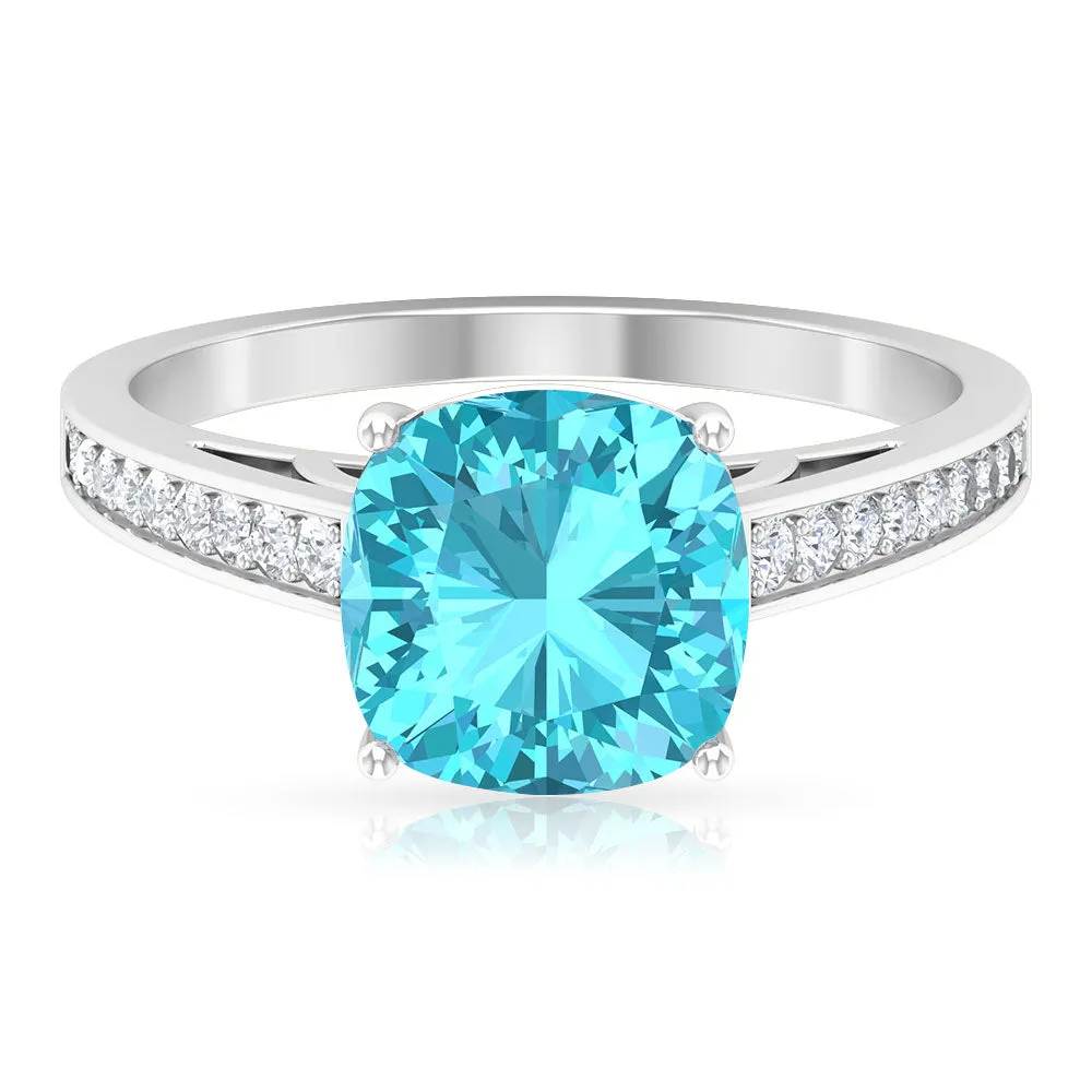 8.5 MM Cushion Cut Swiss Blue Topaz Solitaire with Diamond Side Stone Ring