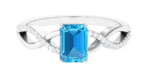 Emerald Cut Swiss Blue Topaz and Diamond Crossover Engagement Ring