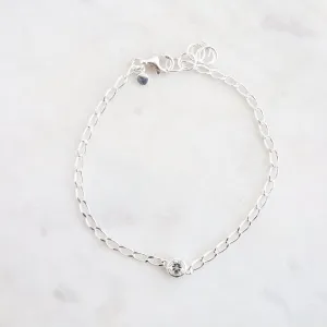 Fine Cut Curb Chain with Round Bezel Set White Topaz Bracelet