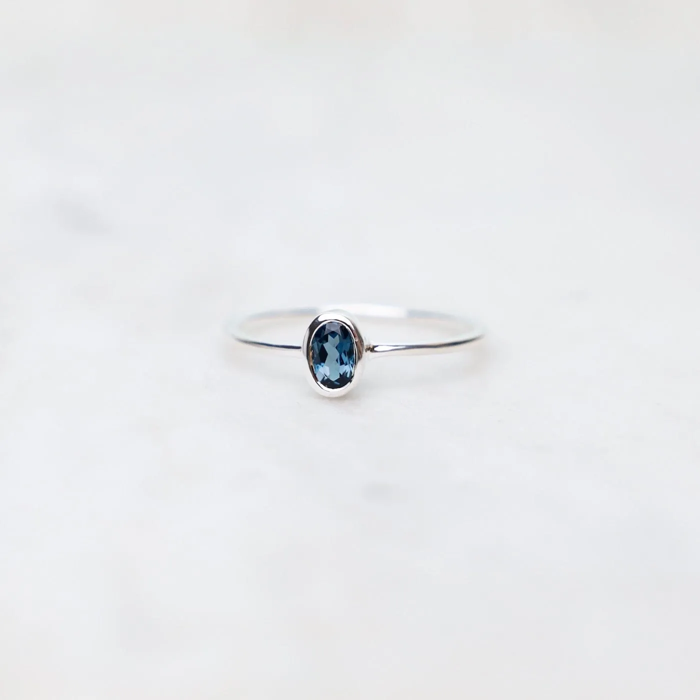 Sterling Silver Oval Bezel Set London Blue Topaz Ring