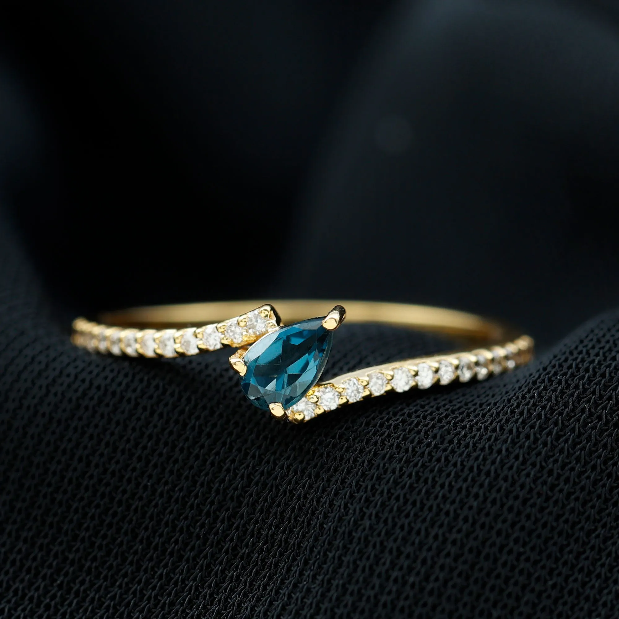 Tilted Pear Shape London Blue Topaz and Diamond Bypass Promise Ring